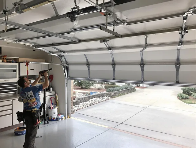 Garage door track repair service by Naugatuck Garage Door Repair in Naugatuck